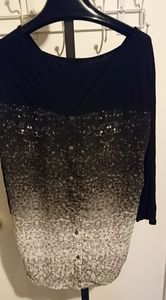 Super cute pattern backed black top